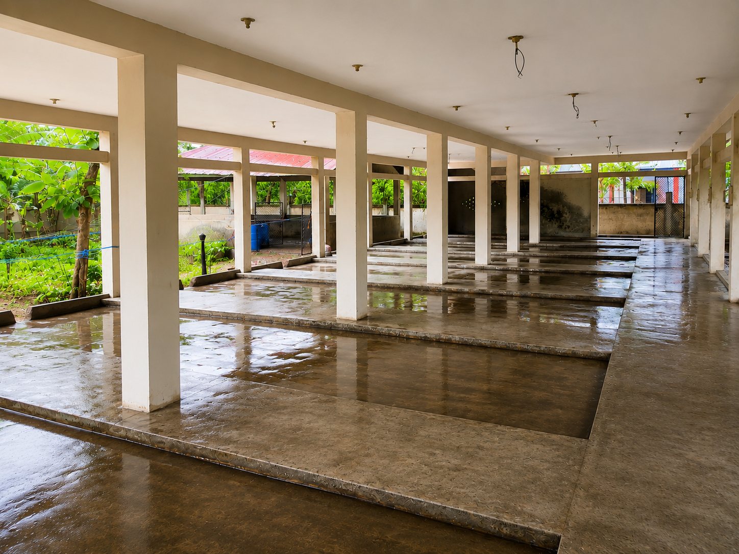 An empty cattle shed at the pilot farm, photographed during setup